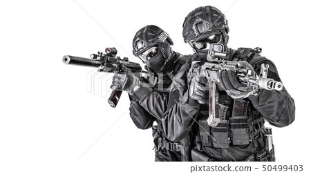 Police elite squad fighters protecting each other Police elite squad fighters protecting each other 50499403