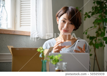 Woman smartphone card shopping Woman smartphone card shopping 50505939