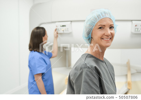 Portrait Of Happy Mature Woman Smiling As Patient In Clinic 50507806