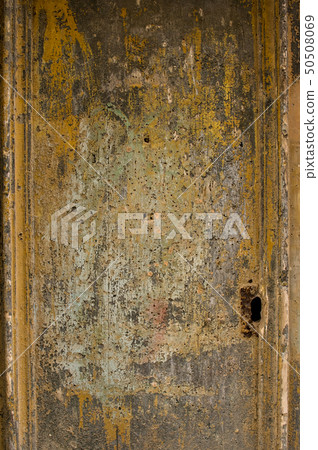 Brown door with paint in Valletta, Malta Brown door with paint in Valletta, Malta 50508069
