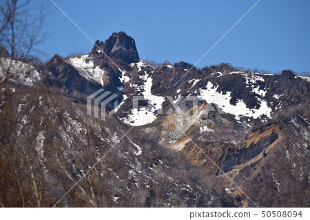 Photographing the landscape of the remaining snow Eniwadake from the lakeside of Lake Shikotsu, Chitose, Japan 50508094