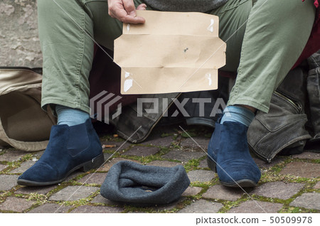 closeup of homeless woman begging  50509978