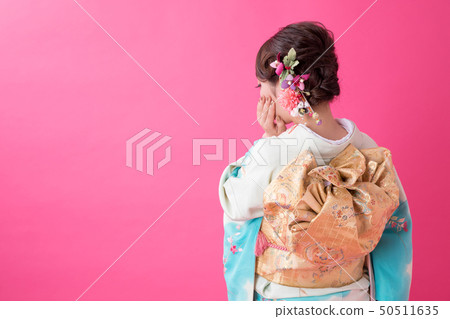 Woman in long-sleeved kimono Woman in long-sleeved kimono 50511635