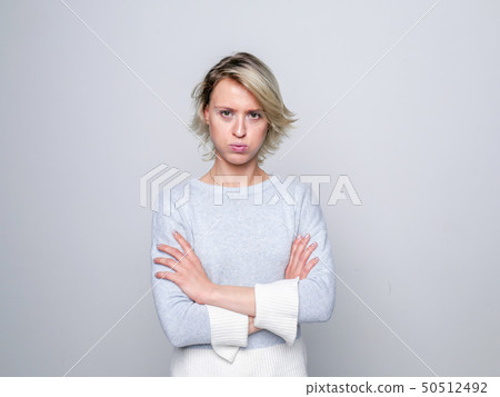 Sad blond Woman in studio. Sad blond Woman in studio. 50512492