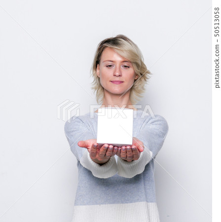 Small gift in the hands of a woman. Small gift in the hands of a woman. 50513058