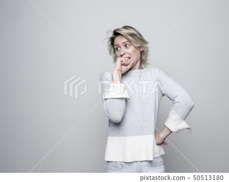 Shocked woman in studio. Shocked woman in studio. 50513180