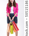 Woman in Trendy clothes with a lot of shopping bag 50515186