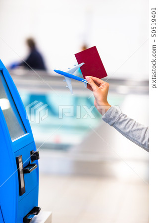 Terminal for self-check-in for flight or buying airplane tickets at airport Terminal for self-check-in for flight or buying airplane tickets at airport 50519401