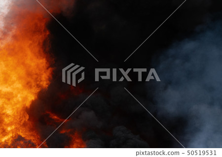 Huge flames of red fire, motion blur clouds 50519531