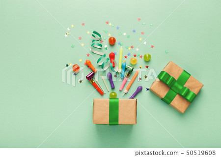 Birthday party background with gift and confetti Birthday party background with gift and confetti 50519608