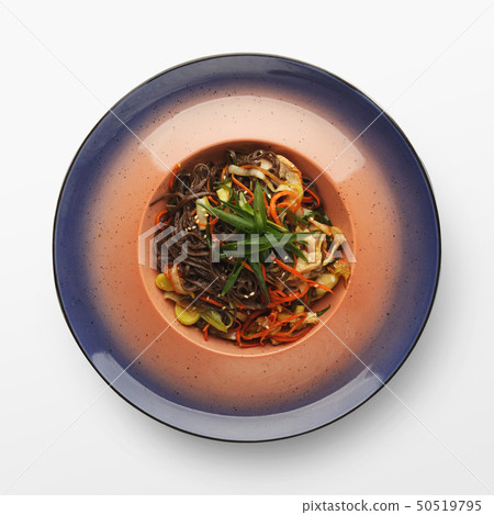 Buckwheat noodles with chicken and vegetables, isolated Buckwheat noodles with chicken and vegetables, isolated 50519795
