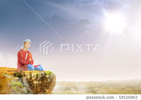 Asian muslim man with turban in his head sitting Asian muslim man with turban in his head sitting 50520802