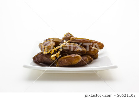 Date palm fruit in the plate Date palm fruit in the plate 50521102