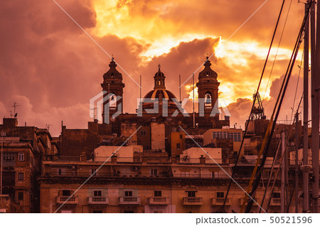 Pink evening in Senglea and view to Basilica 50521596