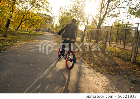 Happy boy ride the bicycle 50521938