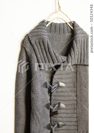 Dark gray thick cardigan on white background 50524348