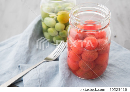 Marinated cherry tomatoes 50525416