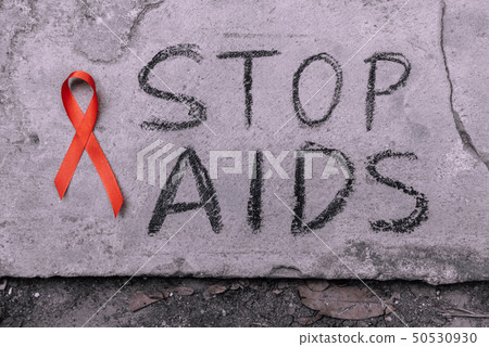 Stop Aids text hand write by black chacoal. Stop Aids text hand write by black chacoal. 50530930