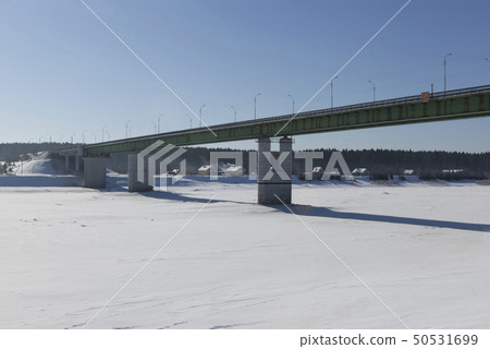 Road bridge over the river in the city Sukhona 50531699