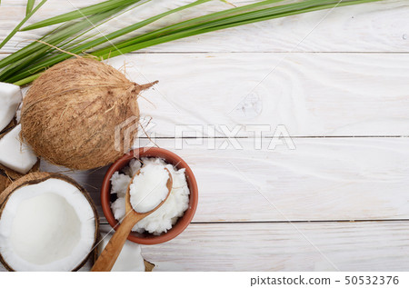 Flat lay Background of coconut, coconut shell, oil Flat lay Background of coconut, coconut shell, oil 50532376