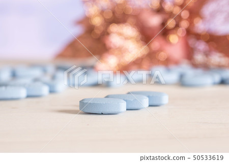 Blue medical pills in a hospital 50533619