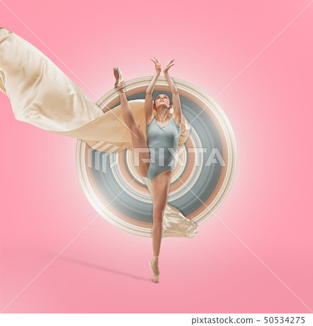 Ballerina. Young graceful female ballet dancer dancing over pink studio. Beauty of classic ballet. Ballerina. Young graceful female ballet dancer dancing over pink studio. Beauty of classic ballet. 50534275