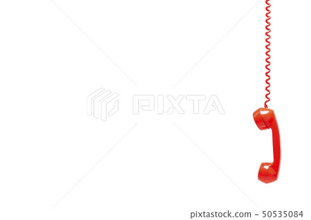 Red old telephone receiver isolated on white 50535084