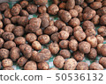 Potatoe, potato, dirty potato background. Potatoes in the market 50536132
