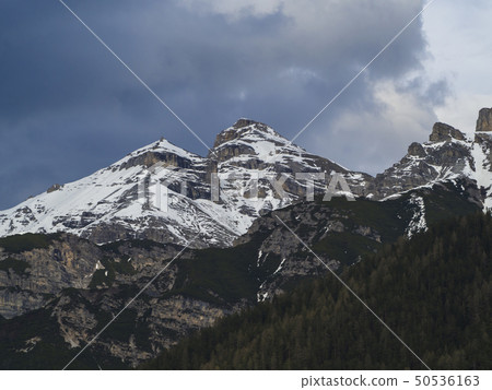 snow covered alpen mountain peaks and forest in Stubaital or Stubai Valley near Innsbruck, Tirol 50536163