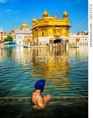 Sikh prayer in Golden Temple, Amritsar, India Sikh prayer in Golden Temple, Amritsar, India 50537572
