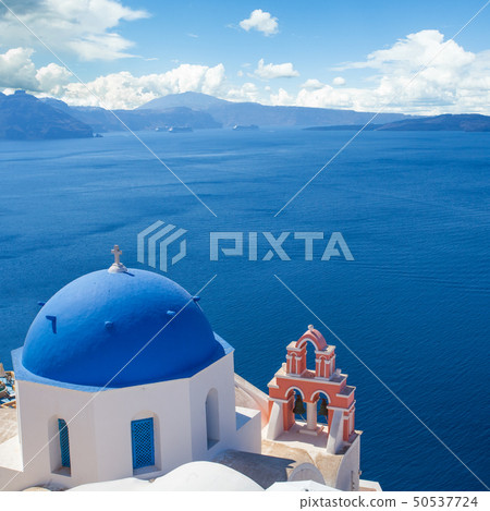 Blue and white church with bell tower 50537724