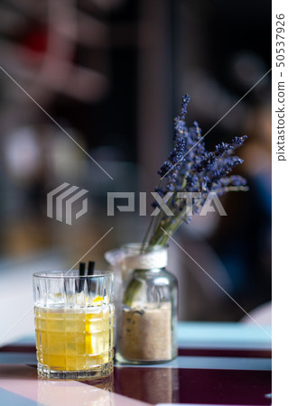 Whiskey sour cocktail on the table on blured bar Whiskey sour cocktail on the table on blured bar 50537926