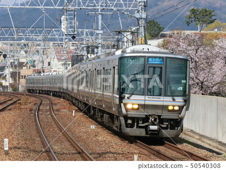 Series 223 new rapid transit passing Sakura Yodogawa Station Series 223 new rapid transit passing Sakura Yodogawa Station 50540308