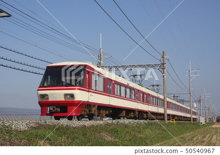 Nishitetsu Limited Express 8000 series train running near Hatama Station on the Tenjin-Omuta Line 50540967