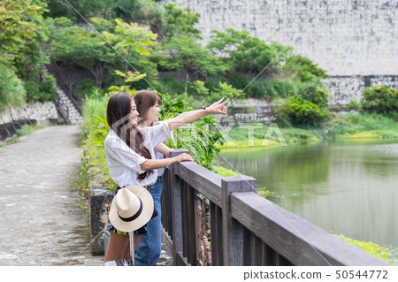 Two women traveling Two women traveling 50544772