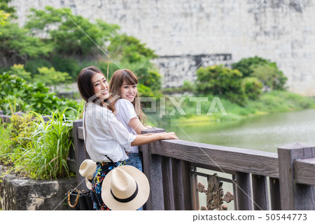 Two women traveling Two women traveling 50544773