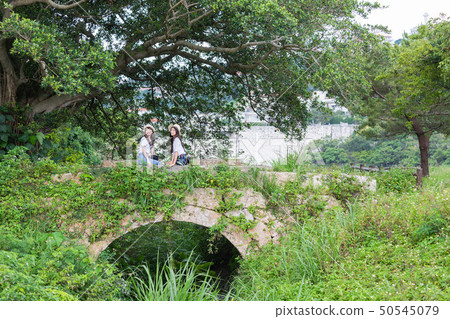 Two women traveling 50545079