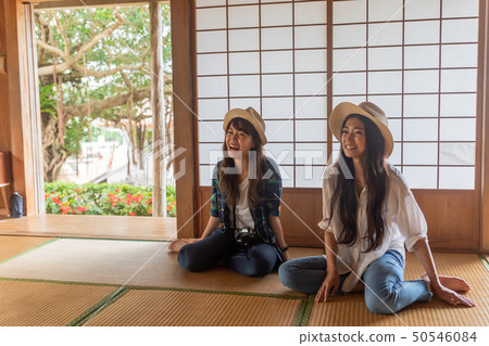 Okinawa travel Two women resting in old folk house 50546084