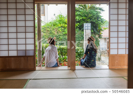Okinawa travel Two women resting in old folk house 50546085