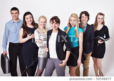 a group of people lined up behind each other with 50546677