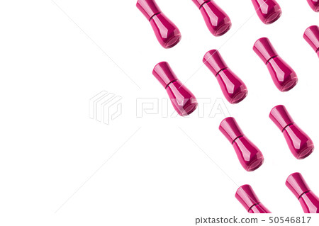 Dark pink nail polish bottle pattern on white Dark pink nail polish bottle pattern on white 50546817