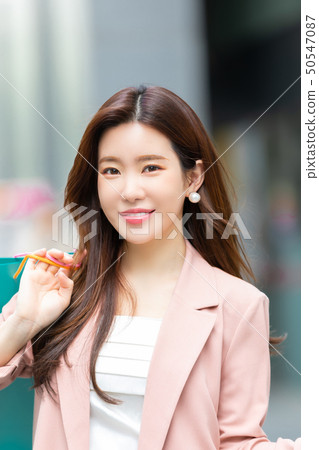 Korean woman shopping 50547087