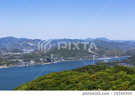 The Kan'u Channel, Kanmon Bridge, and Shimonoseki City Area in May with a View from the Windside The Kan'u Channel, Kanmon Bridge, and Shimonoseki City Area in May with a View from the Windside 50549304
