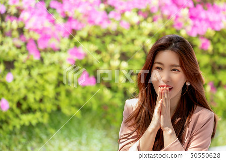 A woman enjoying a happy everyday scene 50550628