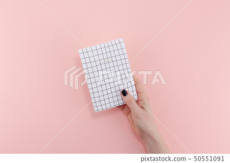 Woman hand with notebook Woman hand with notebook 50551091