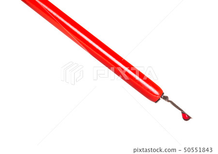 side view of ink drop in red dip pen close up side view of ink drop in red dip pen close up 50551843