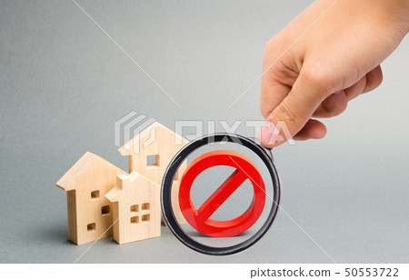Magnifying glass is looking at the No Sign  50553722