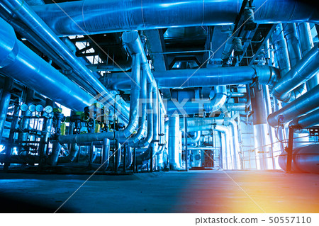pipes and valves at a power plant pipes and valves at a power plant 50557110