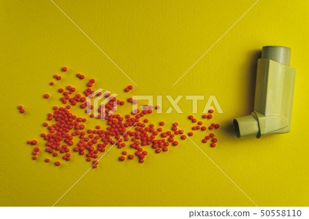 Yellow asthma inhaler with particle aerosol spay Yellow asthma inhaler with particle aerosol spay 50558110
