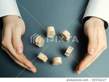 A man wraps his arms around a circle of human A man wraps his arms around a circle of human 50558227